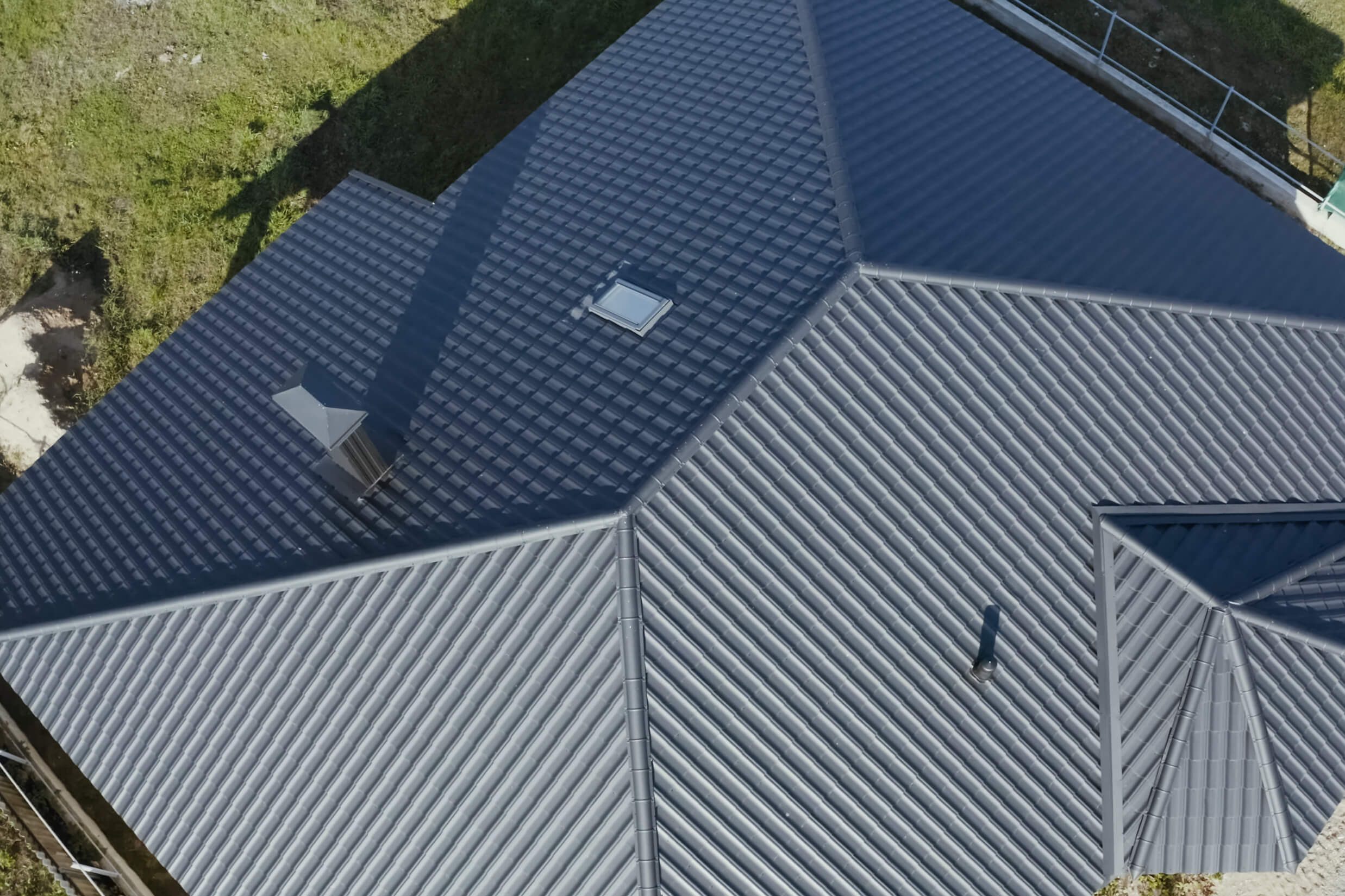 Modern home with sleek metal roof installation